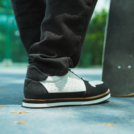 White and black sneaker with perforations