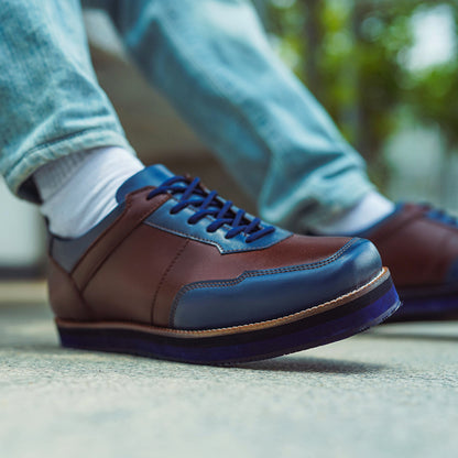 Brown and blue flat-toe sneaker